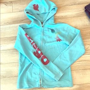 Free City turquoise hoodie.